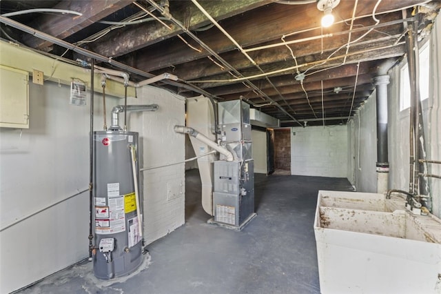 947 Pine St, Ambridge, PA 15003 - basement featuring gas water heater and heating unit