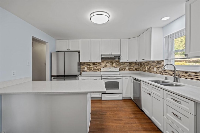 440 Perrymont, Mccandless, PA 15237 - kitchen featuring appliances with stainless steel finishes, a sink, tasteful backsplash, and white cabinets