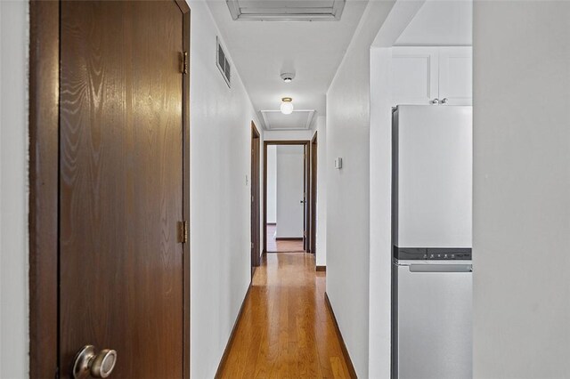 440 Perrymont, Mccandless, PA 15237 - hall featuring attic access, light wood-style floors, baseboards, and water heater