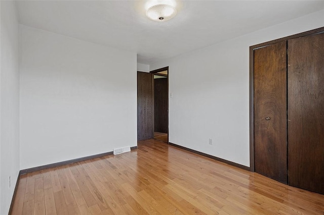 440 Perrymont, Mccandless, PA 15237 - unfurnished bedroom featuring light wood finished floors, baseboards, and a closet