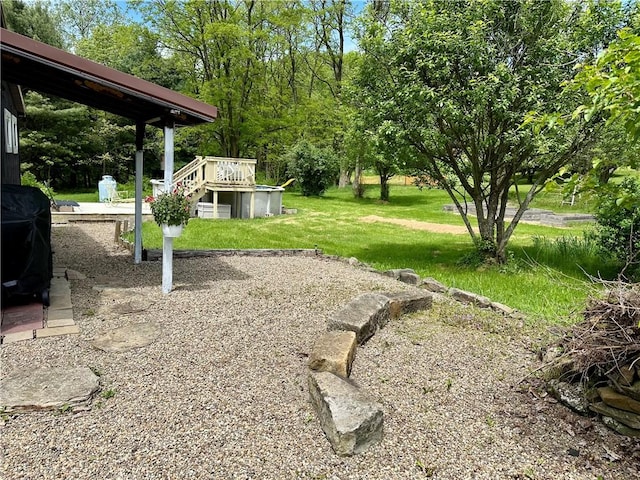 1641 Clintonville Rd, Irwin Twp, PA 16038 - view of grassy yard featuring a deck