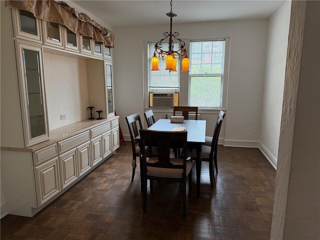 166 N Dithridge St Unit 2A, Oakland, PA 15213 - dining area featuring a chandelier, cooling unit, and baseboards