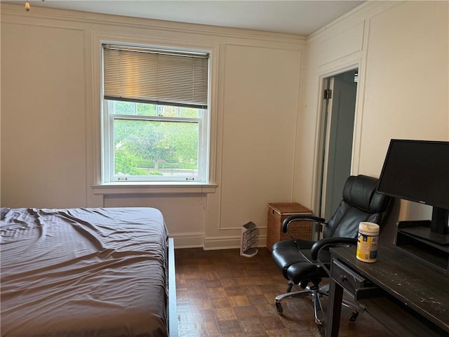 166 N Dithridge St Unit 2A, Oakland, PA 15213 - bedroom featuring baseboards, a desk, and a decorative wall