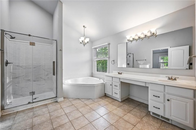 1523 Lori Ln, Hermitage, PA 16148 - bathroom with vaulted ceiling, double vanity, a shower stall, a garden tub, and a chandelier