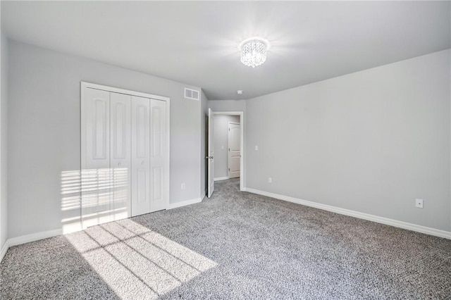 1523 Lori Ln, Hermitage, PA 16148 - unfurnished bedroom featuring carpet floors, baseboards, and a closet