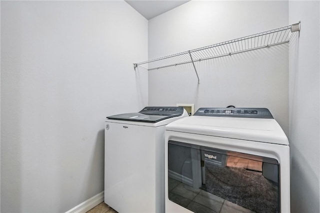 1523 Lori Ln, Hermitage, PA 16148 - laundry room with washer and clothes dryer, baseboards, and tile patterned floors