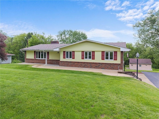 108 Meadowvue Dr, Marshall, PA 15090 - ranch-style home with brick siding, a chimney, and a front yard