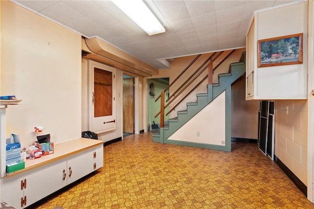 128 Wise Rd, City Of But Se, PA 16002 - finished below grade area featuring stairway and light flooring