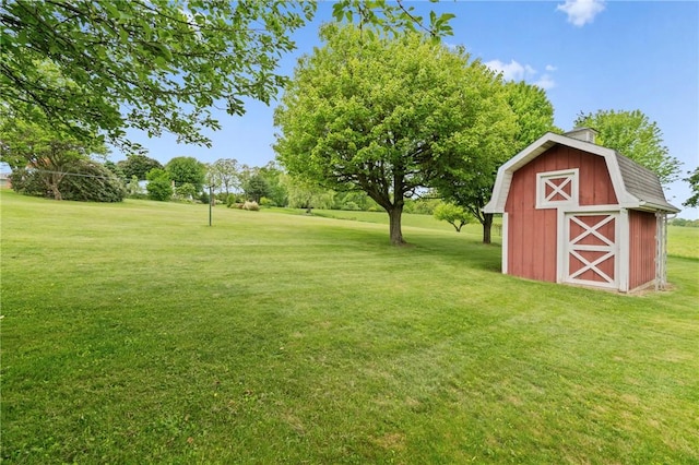 128 Wise Rd, City Of But Se, PA 16002 - view of grassy yard featuring a barn and an outdoor structure