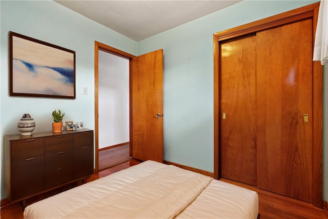 128 Wise Rd, City Of But Se, PA 16002 - bedroom featuring a closet, wood finished floors, and baseboards