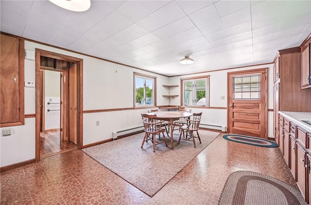 601 Depot St, Jamestown, PA 16134 - dining area featuring baseboard heating, baseboards, and ornamental molding