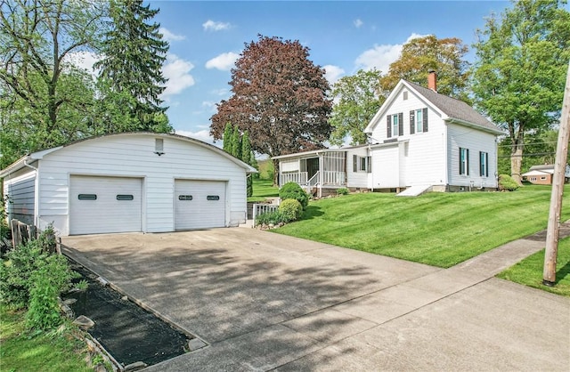 601 Depot St, Jamestown, PA 16134 - view of home's exterior with an outbuilding, a detached garage, and a yard