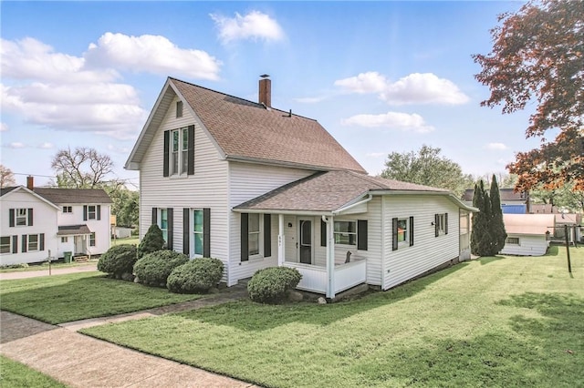 601 Depot St, Jamestown, PA 16134 - back of property featuring a chimney, a yard, and roof with shingles
