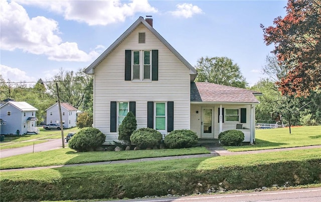 601 Depot St, Jamestown, PA 16134 - traditional-style home with a chimney and a front yard