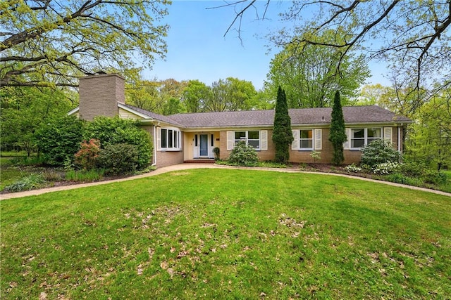 3080 Eldogor Ln, Neshannock Twp, PA 16105 - single story home with brick siding, a chimney, and a front yard