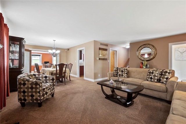 244 Elmtree Rd, New Kensington, PA 15068 - carpeted living area with a chandelier and baseboards
