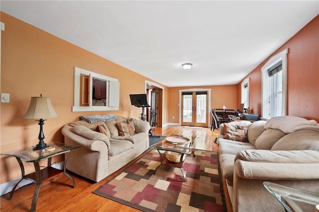 244 Elmtree Rd, New Kensington, PA 15068 - living area with light wood-style floors and french doors