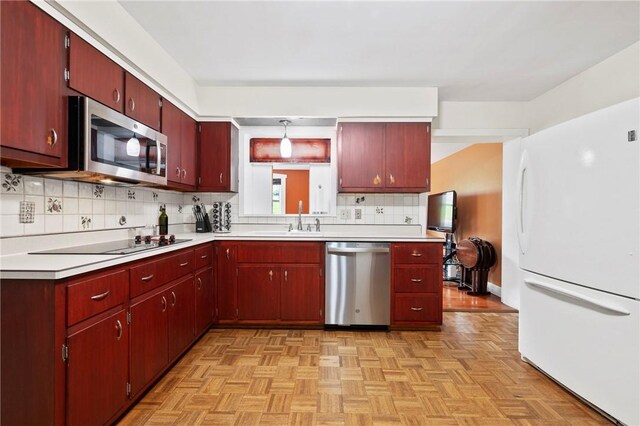 244 Elmtree Rd, New Kensington, PA 15068 - kitchen with appliances with stainless steel finishes, tasteful backsplash, light countertops, and a sink