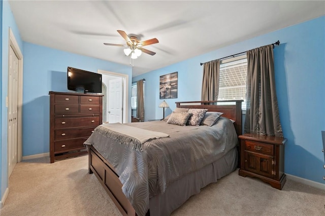244 Elmtree Rd, New Kensington, PA 15068 - bedroom with light carpet, baseboards, and ceiling fan
