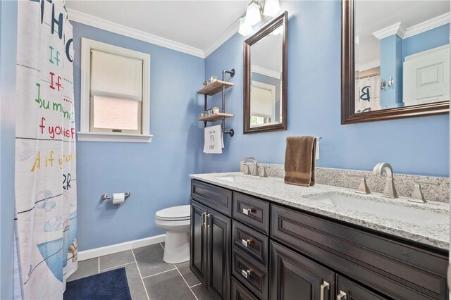 244 Elmtree Rd, New Kensington, PA 15068 - bathroom with toilet, ornamental molding, double vanity, tile patterned floors, and baseboards