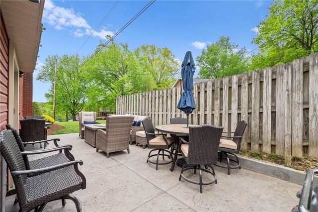 244 Elmtree Rd, New Kensington, PA 15068 - fenced backyard featuring a patio, outdoor lounge area, and outdoor dining area