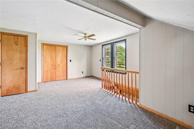13035 State Highway 618, Conneaut Lake Cra, PA 16316 - spare room featuring carpet floors, a ceiling fan, a textured ceiling, and baseboards
