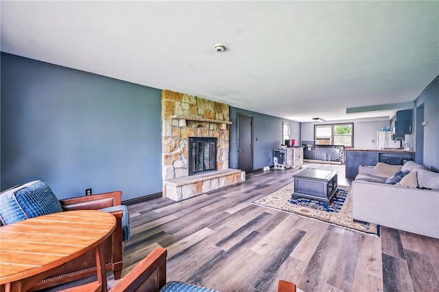 13035 State Highway 618, Conneaut Lake Cra, PA 16316 - living area with a wood stove and wood finished floors