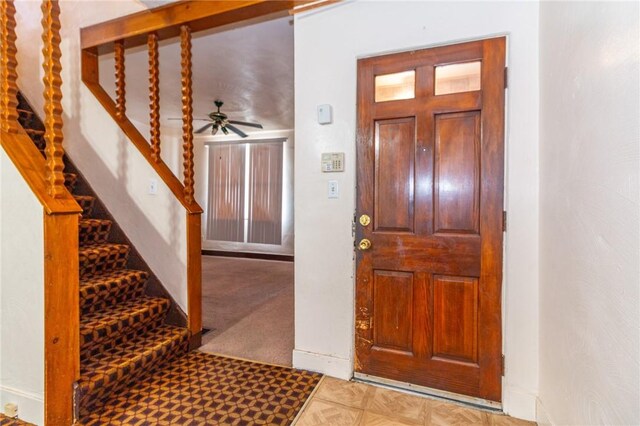2605 Fayette St, Mckeesport, PA 15132 - entrance foyer with a ceiling fan and stairway