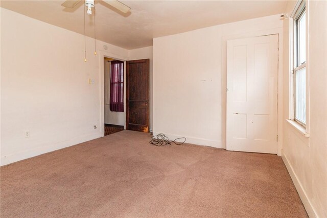 2605 Fayette St, Mckeesport, PA 15132 - carpeted spare room featuring ceiling fan and baseboards