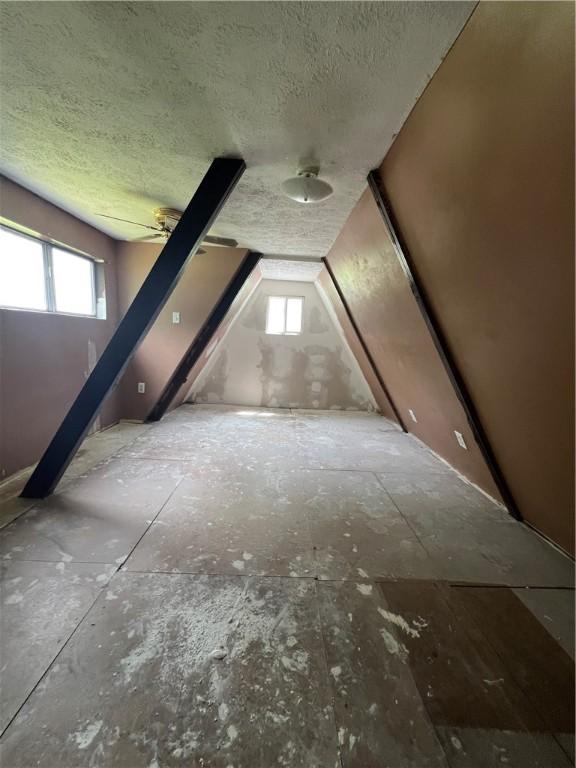 227 Woodlands Rd, Connoquenessing Twp, PA 16033 - additional living space featuring a textured ceiling and healthy amount of natural light
