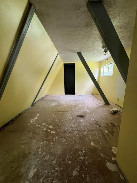 227 Woodlands Rd, Connoquenessing Twp, PA 16033 - additional living space with a textured ceiling
