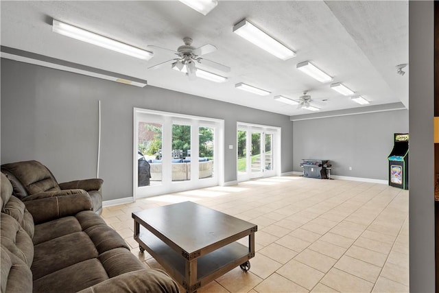 323 Snowberry Cir, Peters Twp, PA 15367 - living area with ceiling fan, baseboards, and light tile patterned flooring