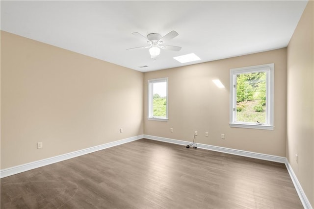 323 Snowberry Cir, Peters Twp, PA 15367 - unfurnished room featuring ceiling fan, healthy amount of natural light, and dark wood-type flooring