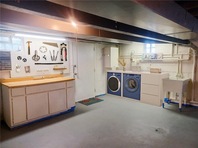 507 Bon Air Rd, Penn Hills, PA 15235 - below grade area with washing machine and clothes dryer and a workshop area
