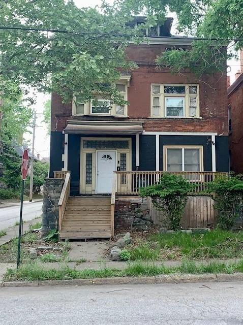 601 N Ave, Wilkinsburg, PA 15221 - view of front facade with covered porch and brick siding