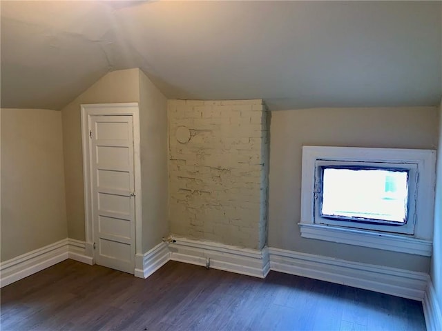 601 N Ave, Wilkinsburg, PA 15221 - additional living space featuring dark wood-style floors, vaulted ceiling, and baseboards