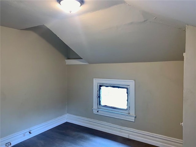 601 N Ave, Wilkinsburg, PA 15221 - bonus room featuring vaulted ceiling, baseboards, and dark wood-type flooring