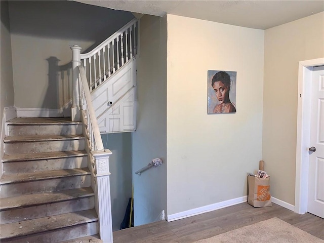 601 N Ave, Wilkinsburg, PA 15221 - stairway with wood finished floors and baseboards