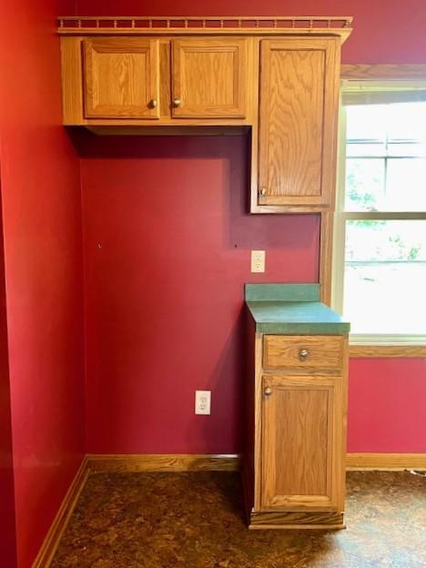 582 Spruce Ave, Sharon, PA 16146 - kitchen featuring baseboards and brown cabinetry
