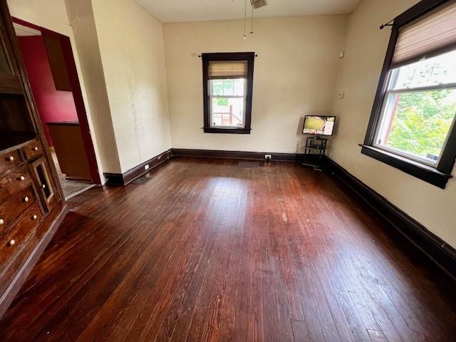 582 Spruce Ave, Sharon, PA 16146 - spare room featuring hardwood / wood-style flooring, baseboards, and a ceiling fan