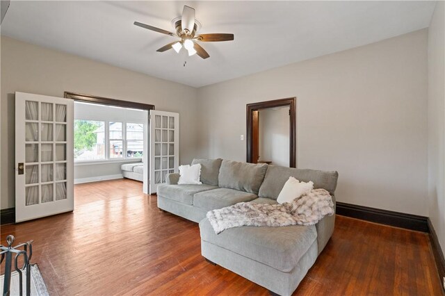 1622 Ridge Ave, Coraopolis, PA 15108 - living room featuring wood finished floors, ceiling fan, baseboards, and french doors