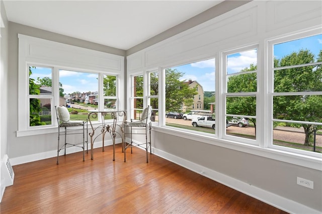 1622 Ridge Ave, Coraopolis, PA 15108 - sunroom featuring healthy amount of natural light, baseboards, and wood finished floors