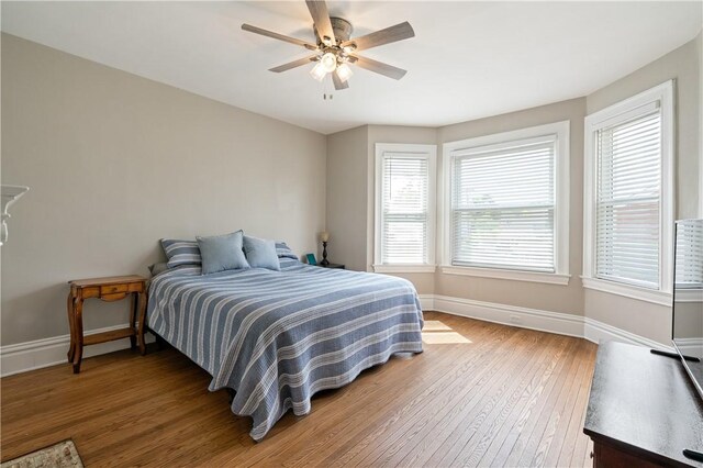 1622 Ridge Ave, Coraopolis, PA 15108 - bedroom featuring hardwood / wood-style floors, baseboards, and ceiling fan