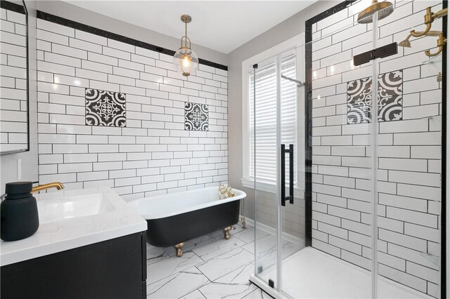 1622 Ridge Ave, Coraopolis, PA 15108 - bathroom featuring marble look tiles, a shower stall, a freestanding tub, vanity, and tile walls