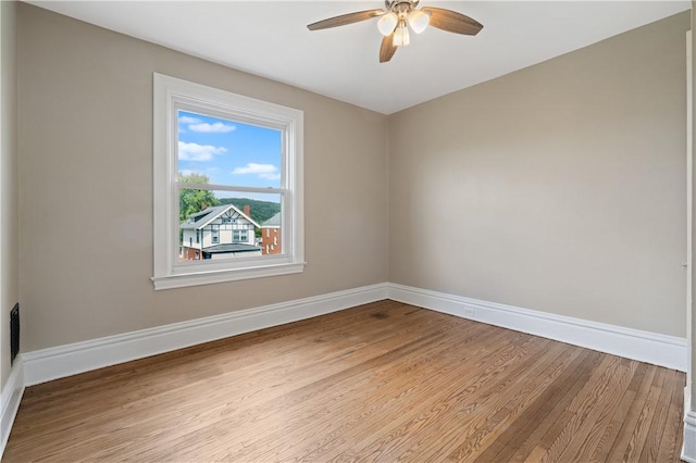 1622 Ridge Ave, Coraopolis, PA 15108 - unfurnished room featuring baseboards, a ceiling fan, and wood finished floors
