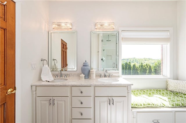 585 Agnes St, Hempfield Twp Wml, PA 15601 - bathroom with a shower stall and double vanity