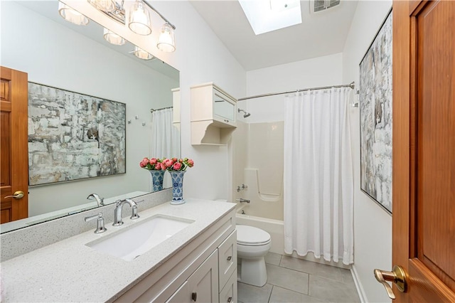585 Agnes St, Hempfield Twp Wml, PA 15601 - full bathroom featuring tile patterned flooring, a skylight, toilet, vanity, and shower / bath combo