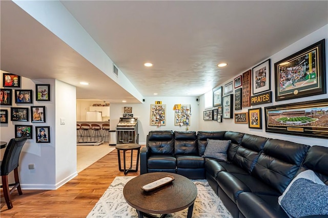 585 Agnes St, Hempfield Twp Wml, PA 15601 - living area featuring recessed lighting, light wood-style flooring, and baseboards