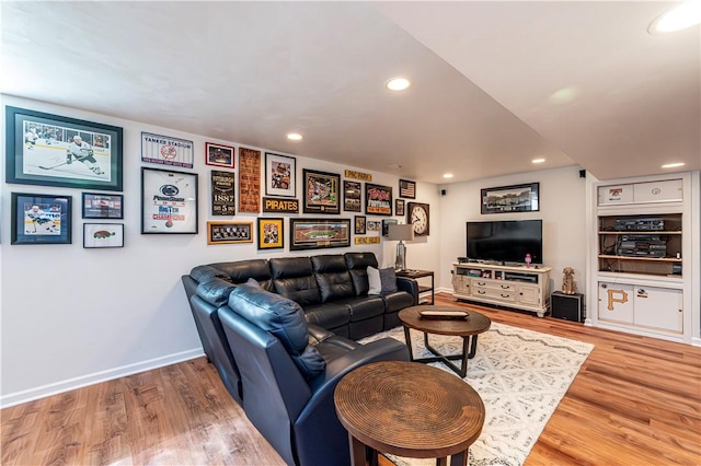 585 Agnes St, Hempfield Twp Wml, PA 15601 - living room with wood finished floors, recessed lighting, and baseboards