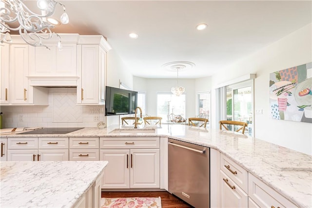 585 Agnes St, Hempfield Twp Wml, PA 15601 - kitchen with stainless steel dishwasher, a chandelier, a sink, black electric cooktop, and white cabinets